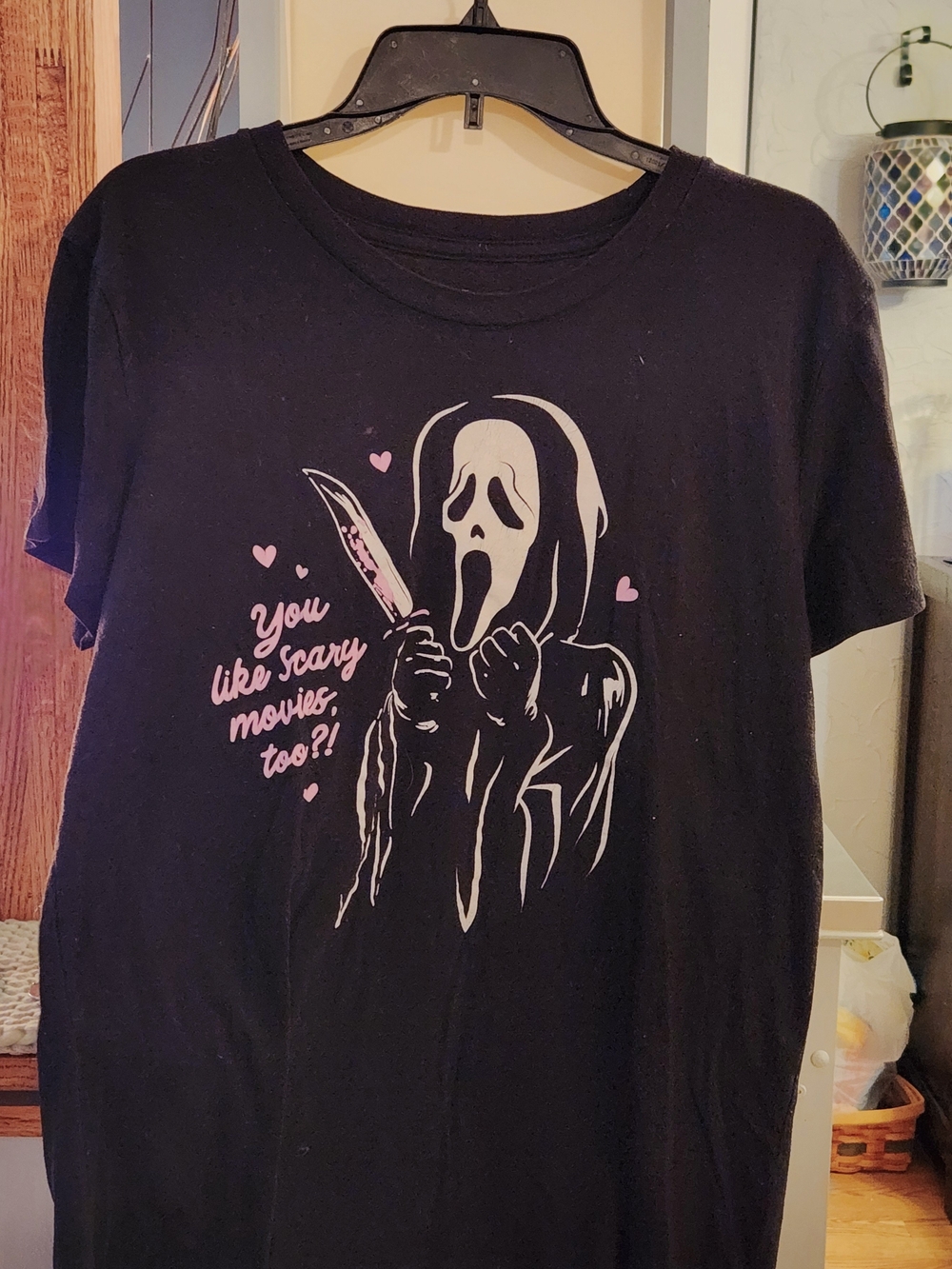 Black Graphic Short‑Sleeve Tee with Pink Horror Print. Do You Like Scarey Movies